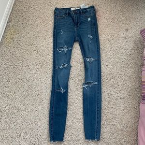 Hollister, size 0, dark blue ripped jeans